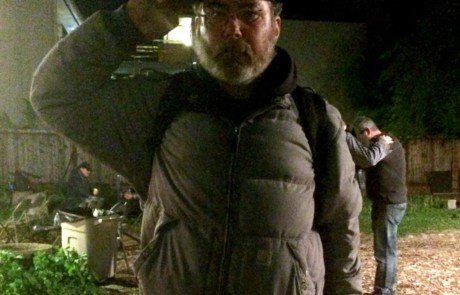 homeless man saluting