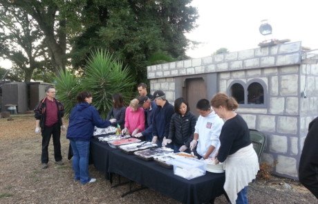volunteers serving dinner